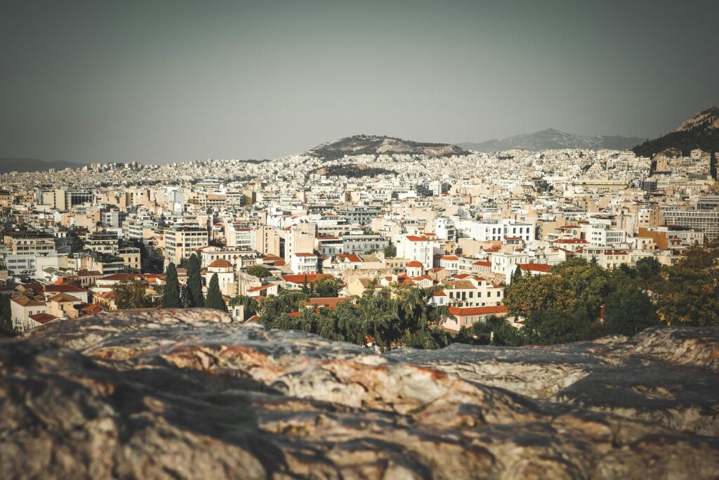 pexels photo 14349174 14349174 Discover a stunning urban panorama of Athens, showcasing its dense architecture and historic charm.
